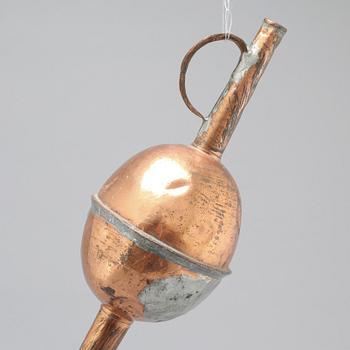 A 19th century pipette in copper.