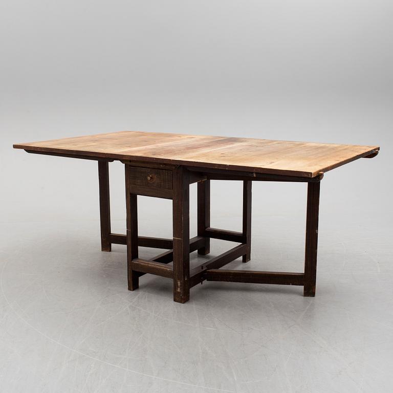 A end of the 19th century pine gate leg table.