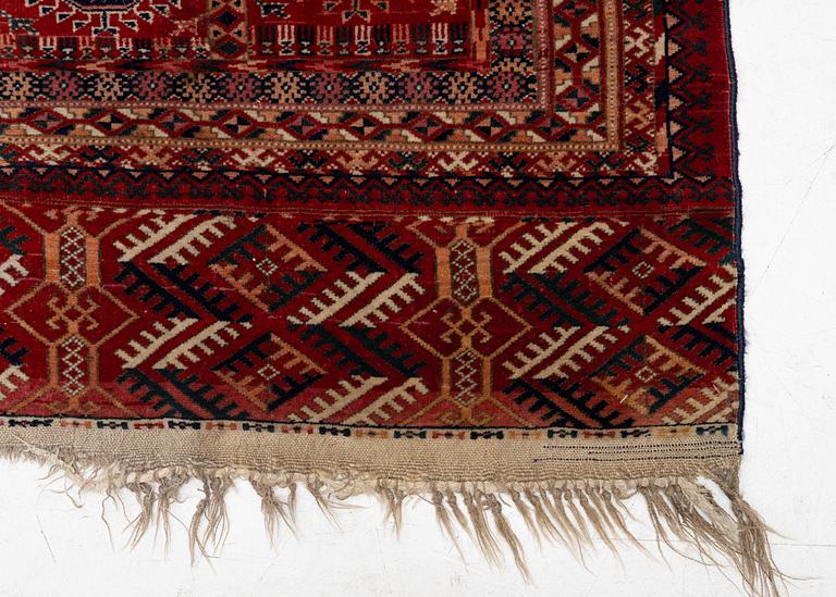 An antique Tekke, around 1890, c. 377 x 309 cm.