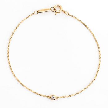 Tiffany & Co, Elsa Peretti, armband, "Diamonds by the Yard", 18K guld med en diamant ca 0.05 ct.