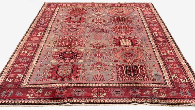 An antique Agra carpet of 'Timuri Baluch' design, Northern India, c. 265 x 181 cm.