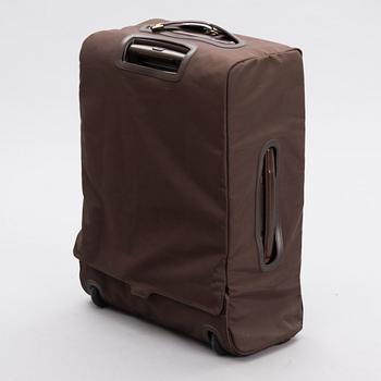 LOUIS VUITTON Damier Ebene Brown Pégase Suitcase with protective cover.