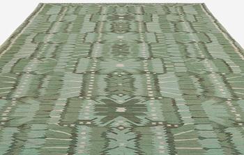 Barbro Nilsson, a carpet, 'Strålblomman grön', tapestry weave, c 516 x 310 cm, signed AB MMF BN ANNO DOMINE 1954.