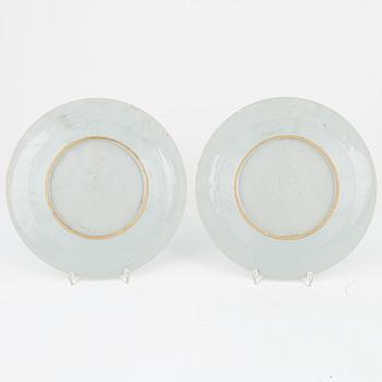 A famille rose punch bowl and two plates, Qing dynasty, Qianlong (1736-95).