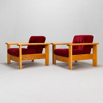 A pair of 1970's armchairs.