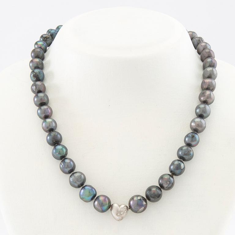 Ole Lynggaard, Lock 18K white gold with accompanying necklace of cultured pearls.