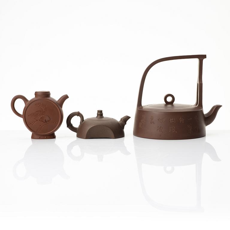 A group of three Chinese yixing teapots, 1980s.