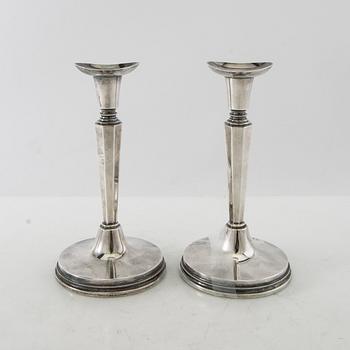 Eric Löfman, candlesticks, a pair, silver, MGAB, Uppsala, 1974.