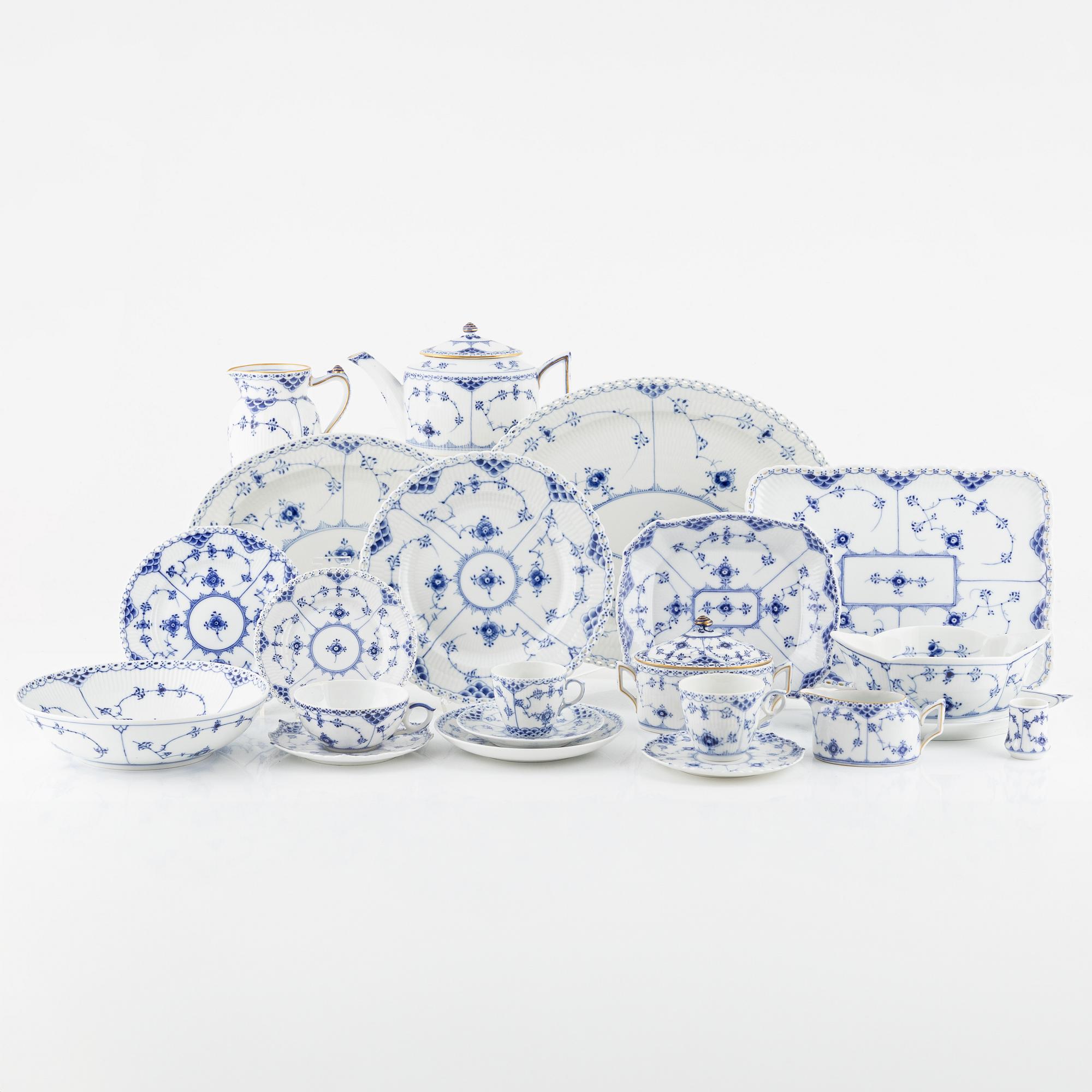 Royal Copenhagen, 76 porcelain service parts, 'Musselmalet Full Lace and Half Lace', Denmark.