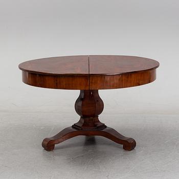 A mahogany veneered dining table, mid 19th Century.