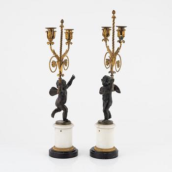 A pair of Louis XVI style candelabra, 19th Century.