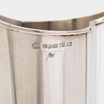 Tapio Wirkkala, a 'Liekki' (Flame) silver vase on a rosewood base, model TW 228, Kultakeskus, Hämeenlinna 1963.