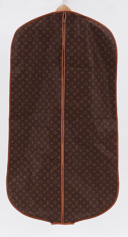 A monogram canvas wardrobe trunk by Louis Vuitton.