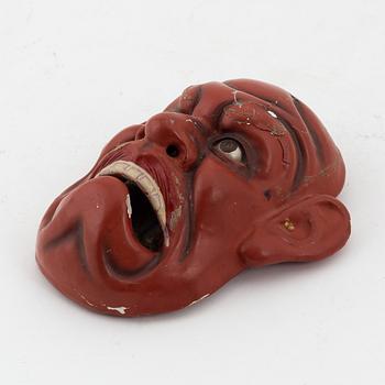 A Japanese masque, circa 1900.