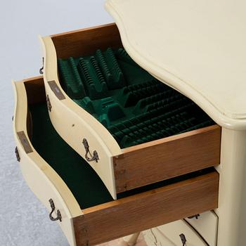 A Rococo style chest of drawers, mid-20th century.