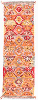 A Kilim runner, c. 255 x 85 cm.