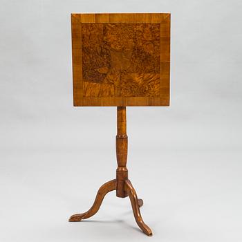 A tilt-top tripod table,  first half of the 19th century.