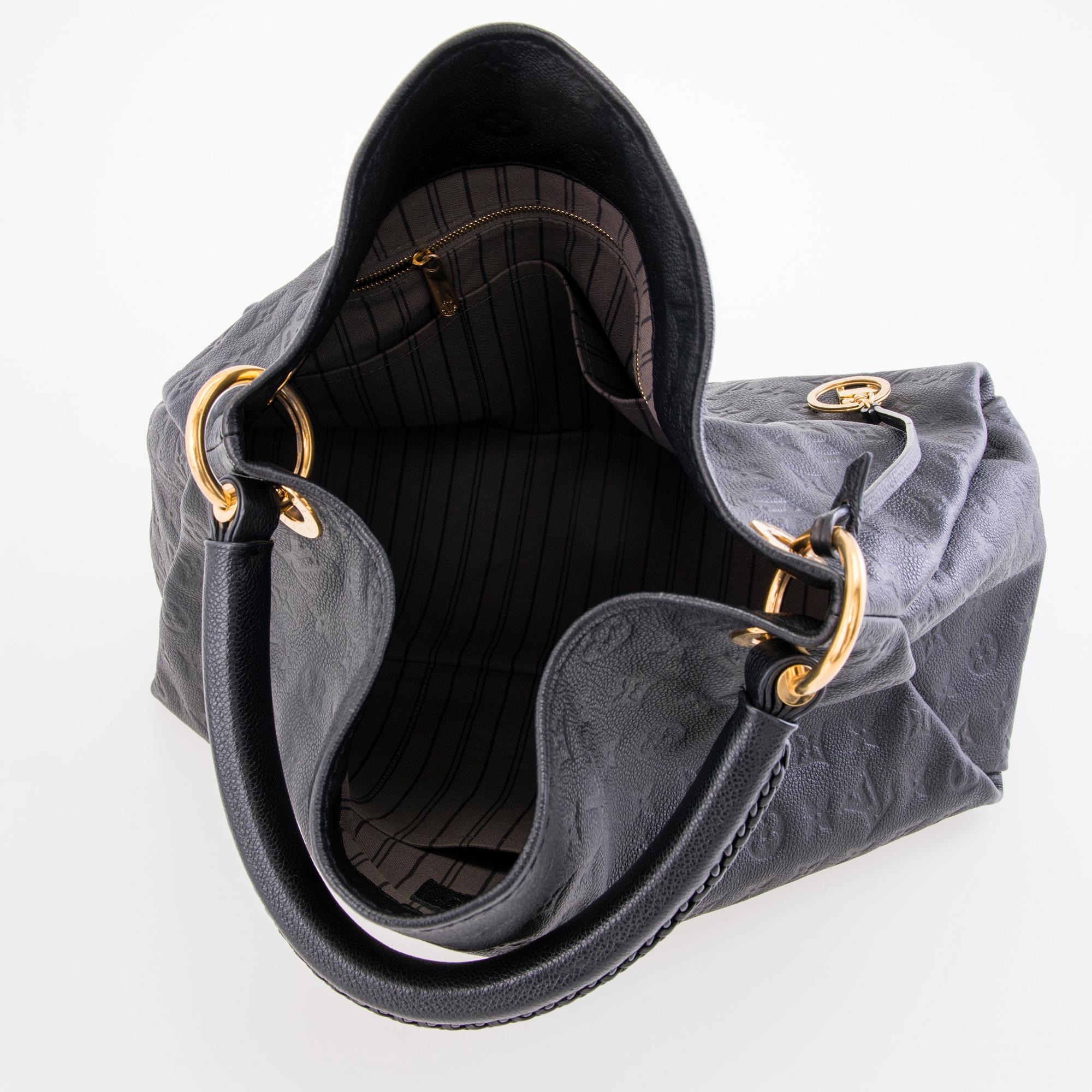 LOUIS VUITTON Black Monogram Empreinte Artsy MM Bag. Bukowskis