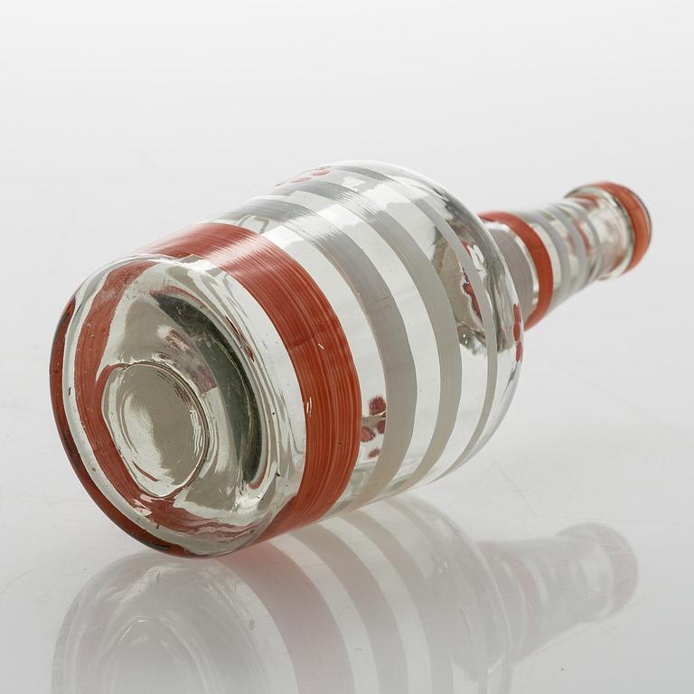 A set of 6 snapsglasses and a bottle designed by Aino Aalto for Karhula in the 1930-1940's.