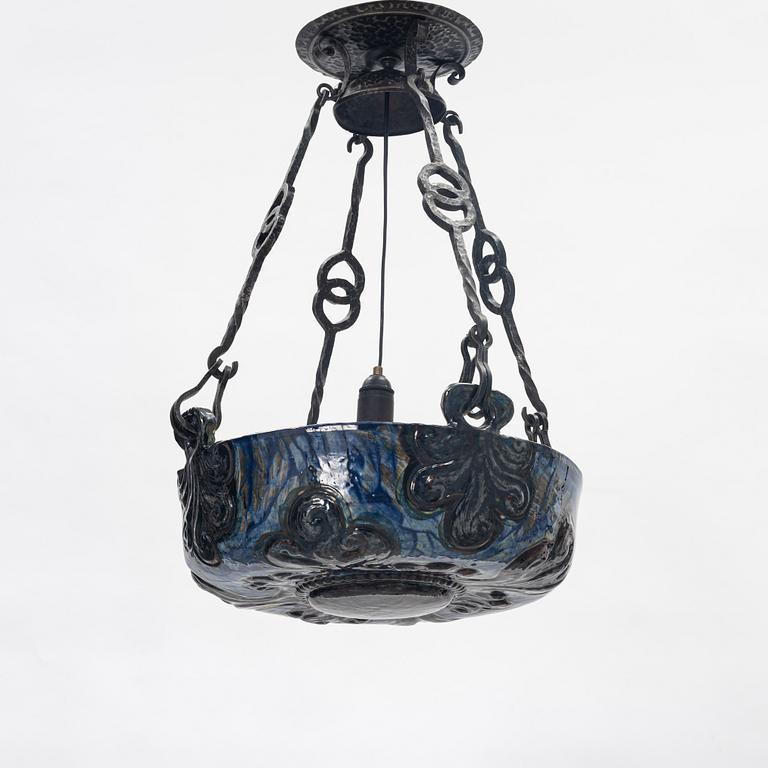 A Swedish Art Nouveau ceramic and iron ceiling light, Höganäs, early 20th century.