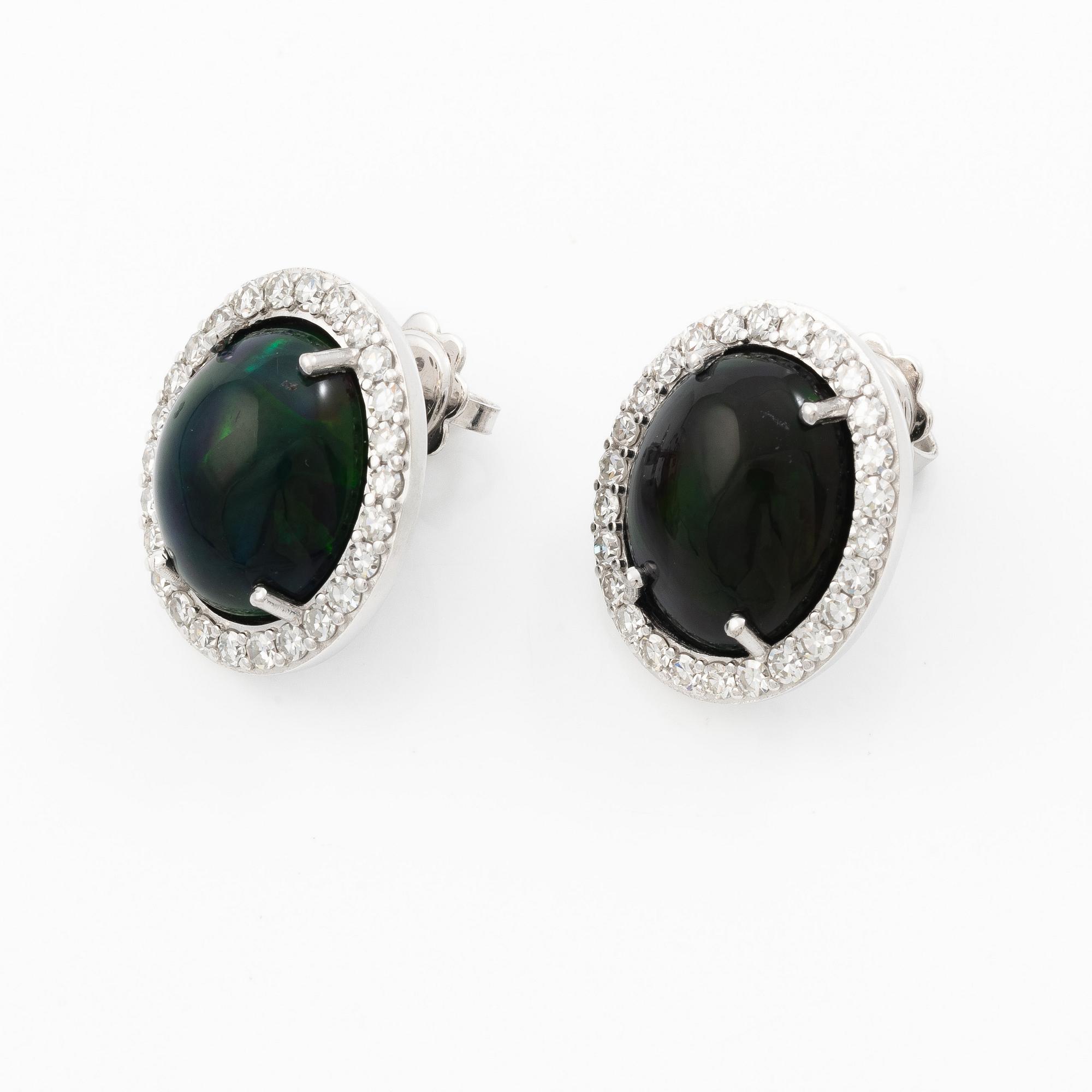 Earrings 18K white gold with opals and octagon-cut diamonds.