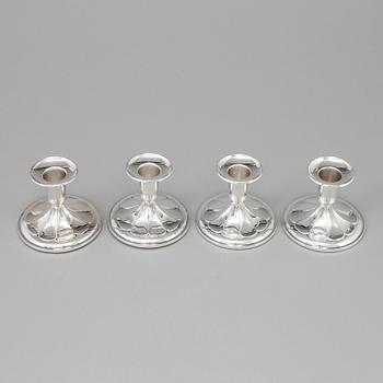 A set of four silver Candlesticks,