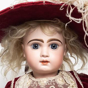 Girl doll, likely France, around the year 1900.