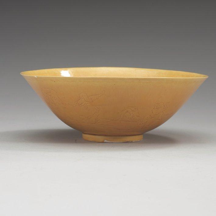 A yellow glazed bisquit bowl, Qing dynasty, Kangxi (1662-1722).