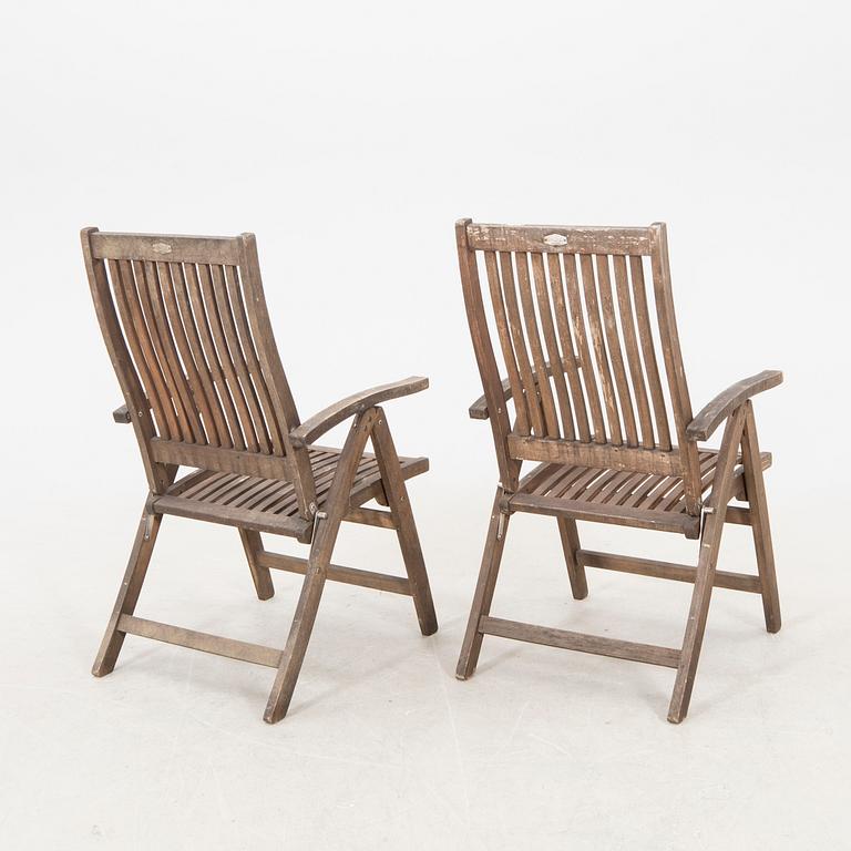 A 9 pcs stained teak garden suite by Brafab around 2000.