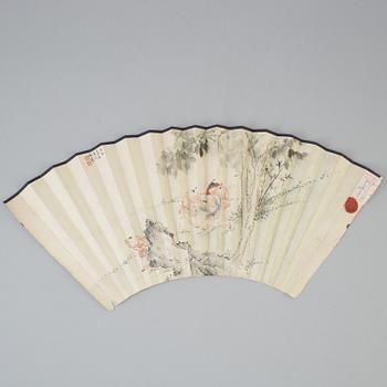 A fan leaf painting by Wu Shidan, signed and dated 1942.