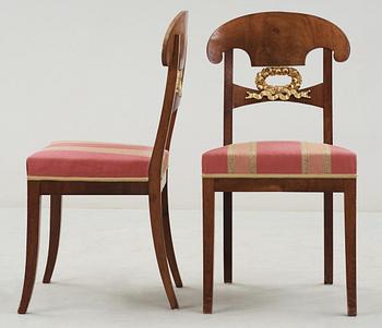 Four Swedish Royal Empire chairs.