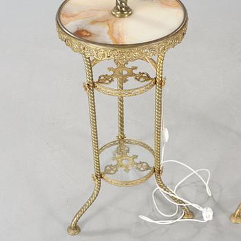 Two floor parafine lamps, 20th century.