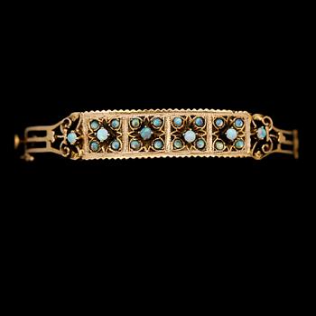 ARMBAND, 14K guld och opaler, 1900-talets mitt. Total vikt ca 19 g.