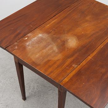 Table with drop leaves, 19th century.