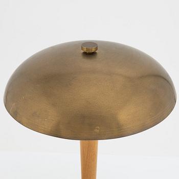 A Swedish Morden brass and elmwood table light, 1940's.