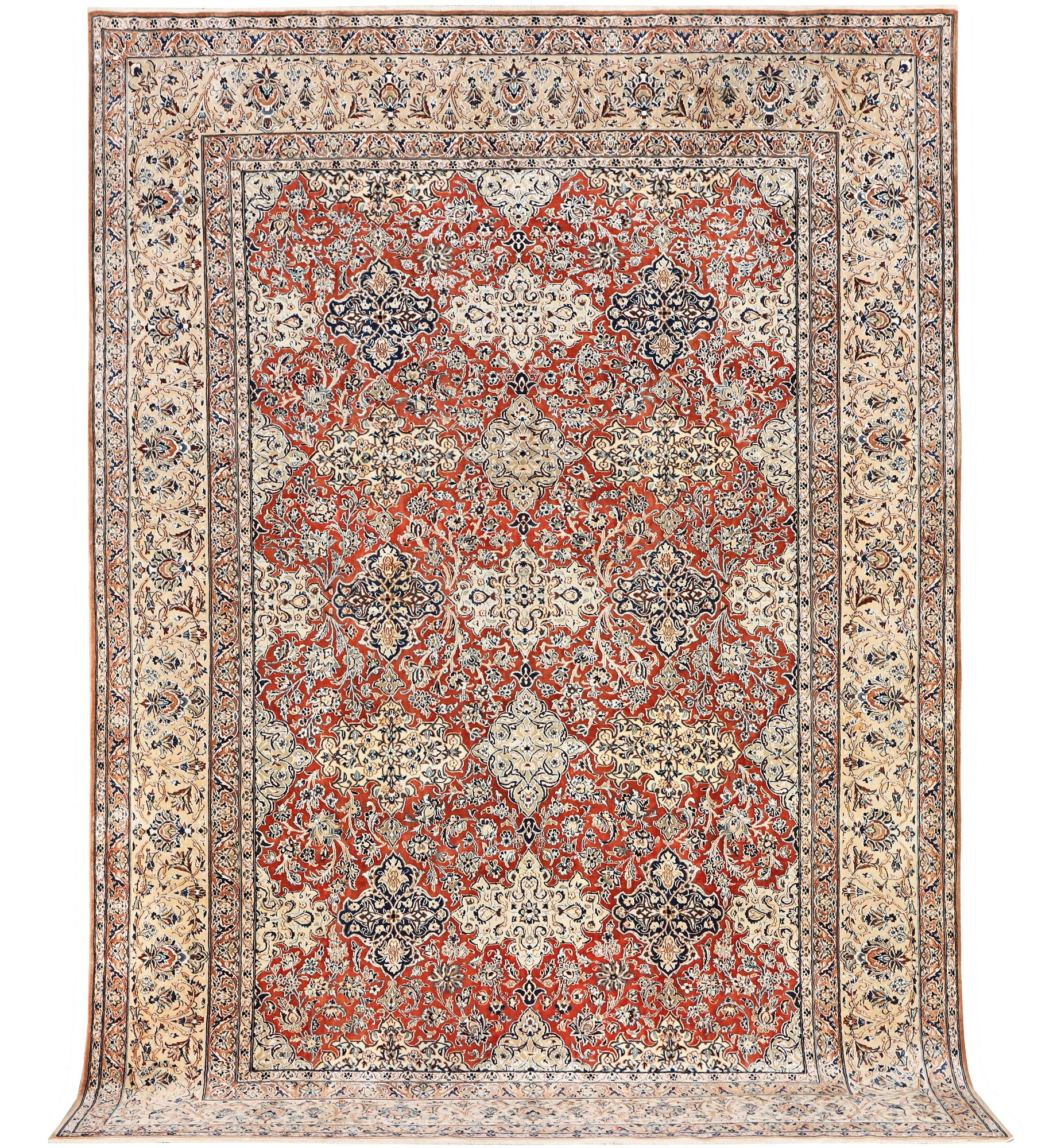 A Nain carpet, part silk, 9 laa, c. 343 x 230 cm.