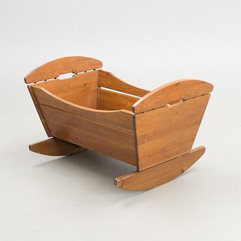 An early 1960s cradle 'Apu' manufacturer Laukaan Puu, Finland for Apu magazine.