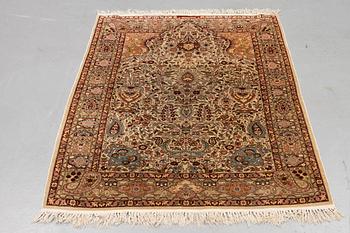 A rug, Old silk Hereke, ca 152 x 110 cm.