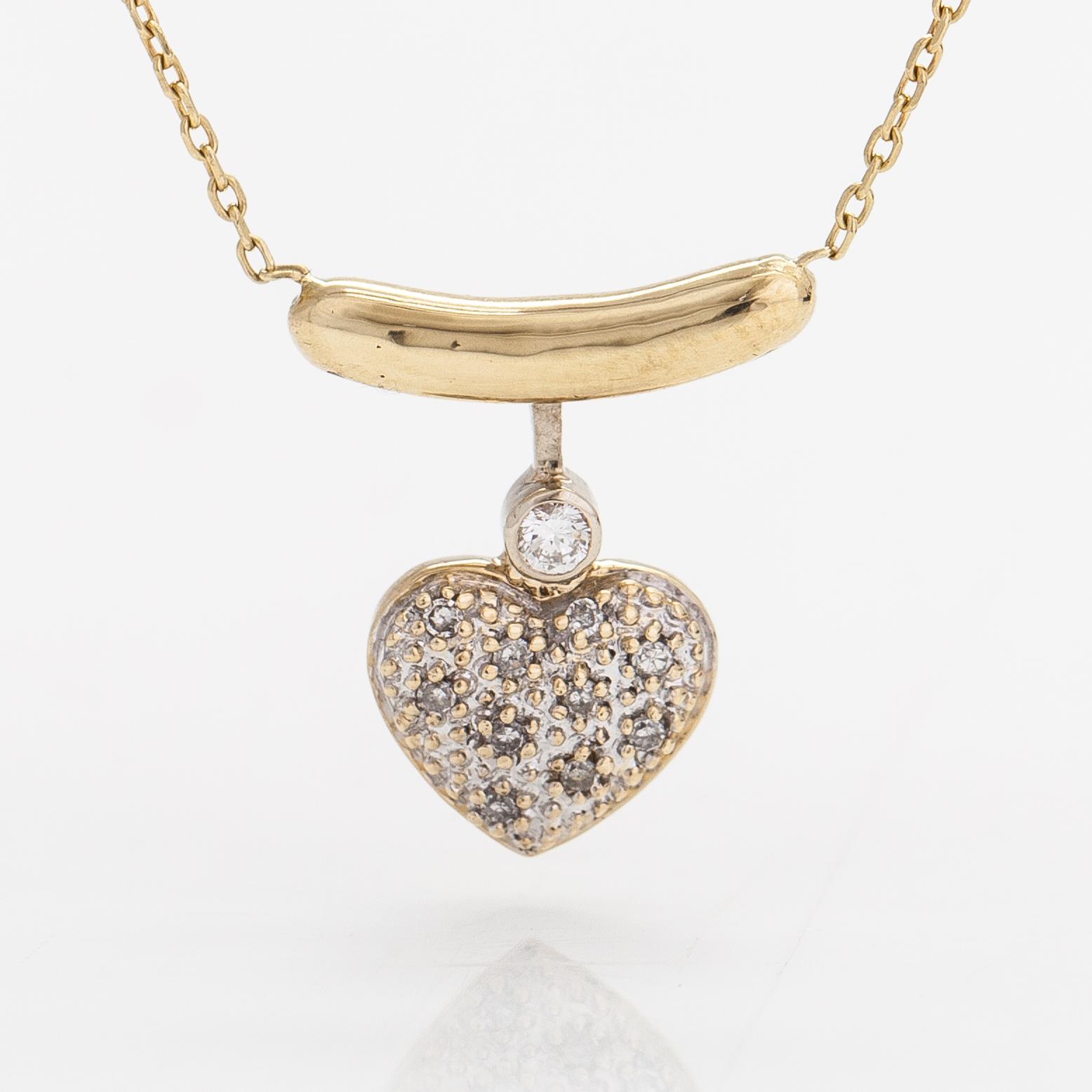 A 14K gold necklace with diamonds ca. 0.08 ct in total.