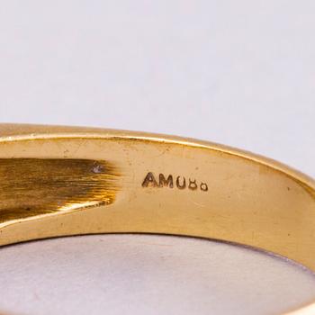 A 18K gold ring with 5 different stones: citrine, amethyst, topaz, garnet, peridot and a small diamond. Probably H.Stern.