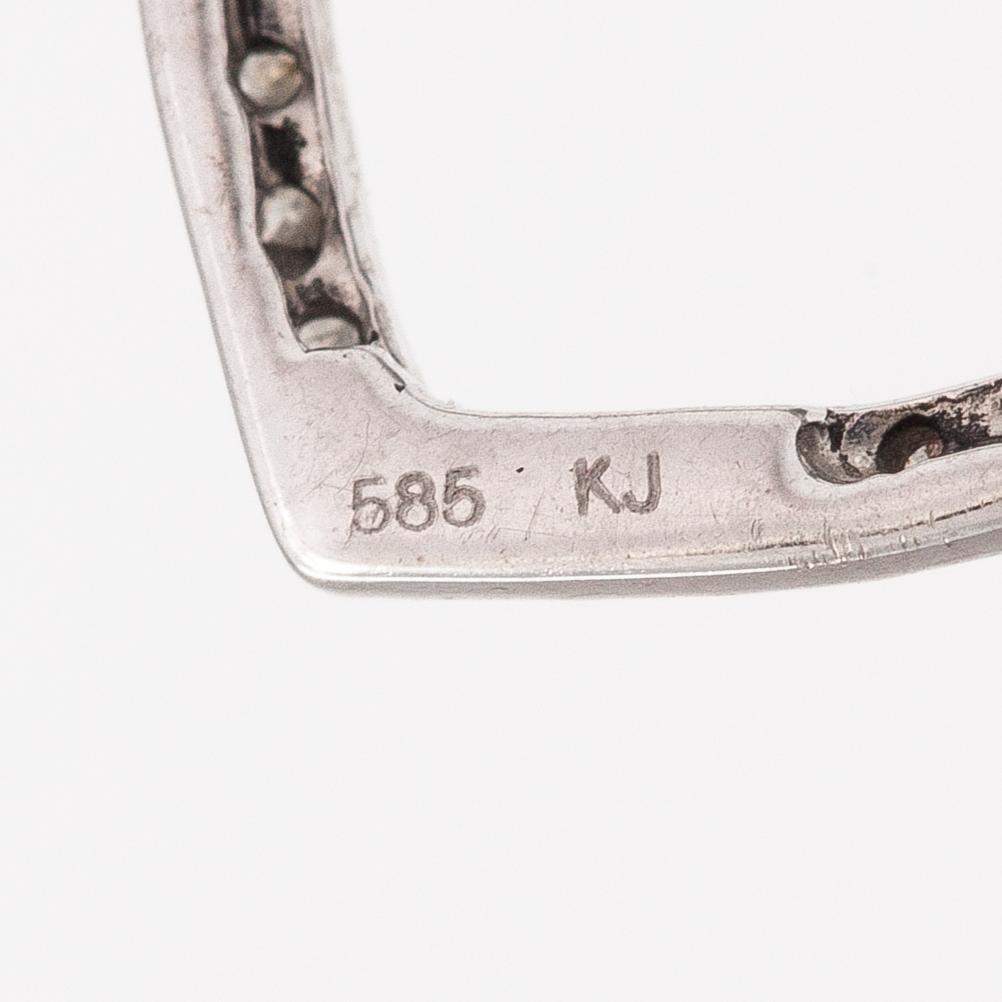 Riipus, 14K valkokultaa, timantteja n. 0.15 ct yht. Kultajousi, Helsinki.