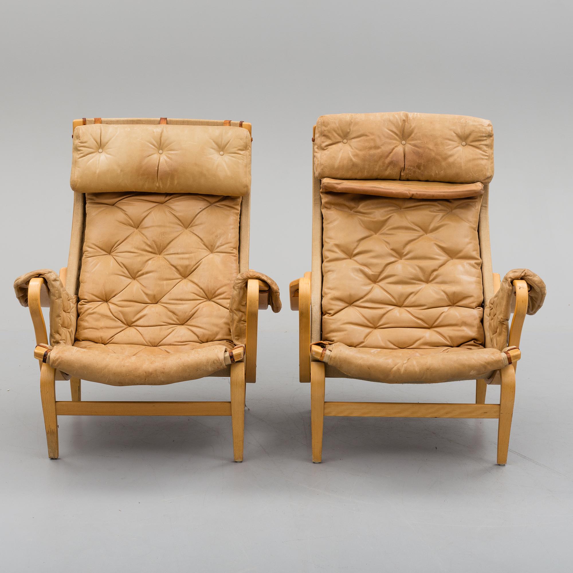 a pair of 'Pernilla' easy chairs by Bruno Mathsson, second half of the 20th century.