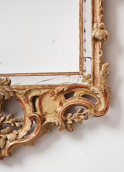 A Swedish rococo giltwood mirror attributed to N. Sundström (master in Stockholm 1754-81).