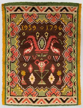 A Finnish folkart long pile Ryijy-rug dated 1959-1796 after Punkalaiduin model. Circa 164 x 125 cm.