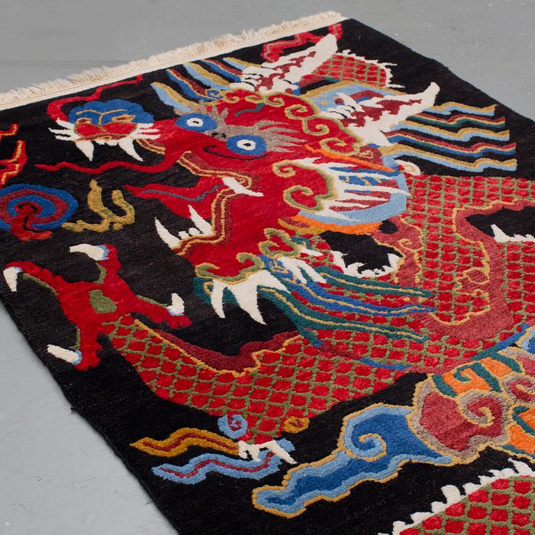 A Tibitian rug, around 169 x 92 cm.