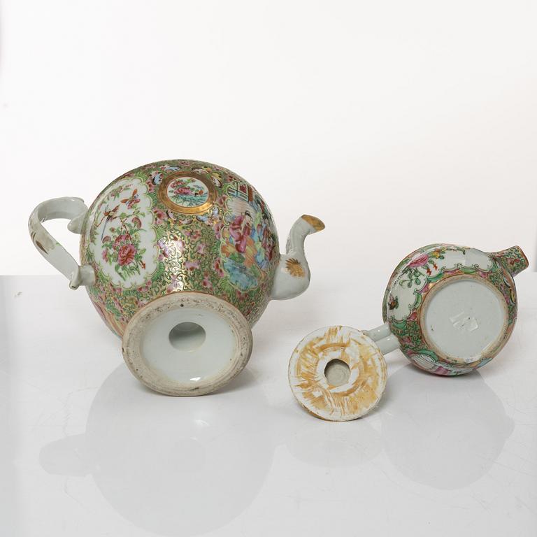 A Chinese Canton porcelain teapot, two leaf dishes, a bowl with cover and a jug, Qing dynasty 19th century and 20th cent.