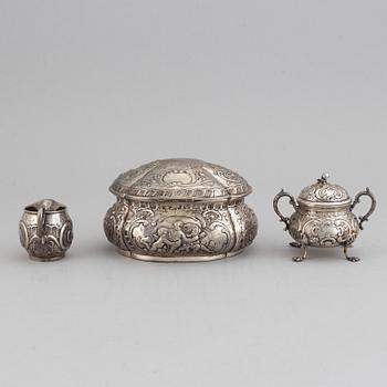 A german silver 800 sugar box, creamer and sugar bowl.