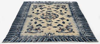An antique Chinese ' five dragon rug', c. 280 x 190 cm.