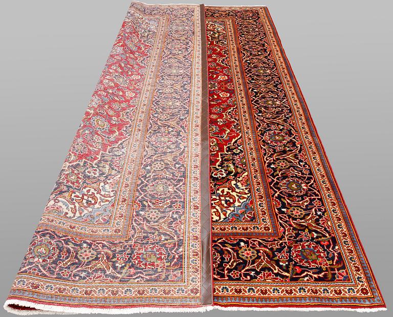 A Keshan carpet, 304 x 203 cm.