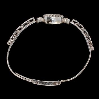 DAMARMBANDSUR, Reimar, 18k vitguld med 16 briljantslipade och 26 åttkantslipade diamanter, 1900-tal. Vikt 29 g.